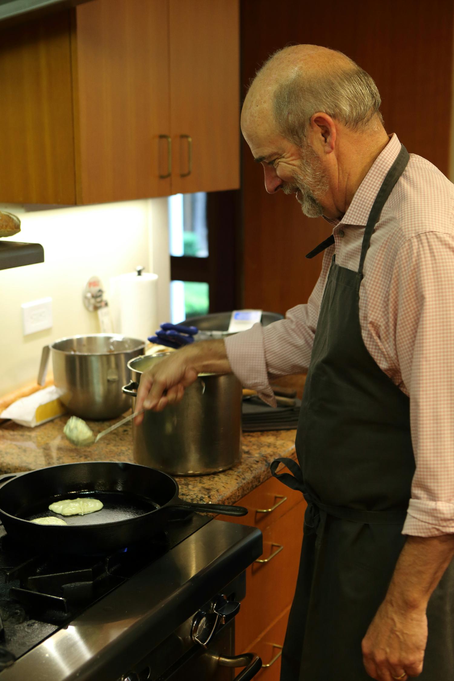 Co-Owner Bruce Cakebread flipping pancakes at the winery house for employees at our annual employee Pancake Breakfast.