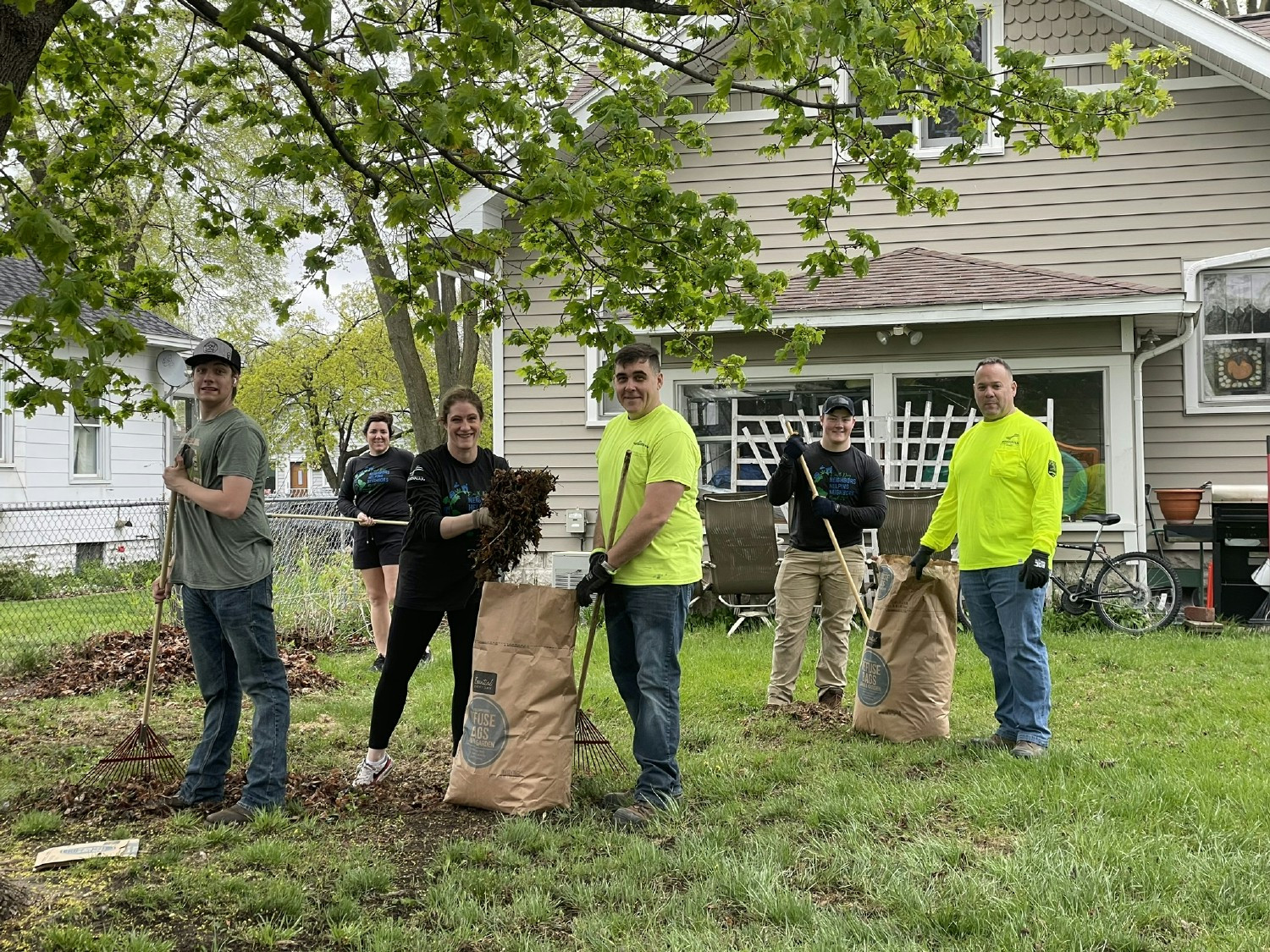 Helping clean up the block on Neighbors Day 2024!