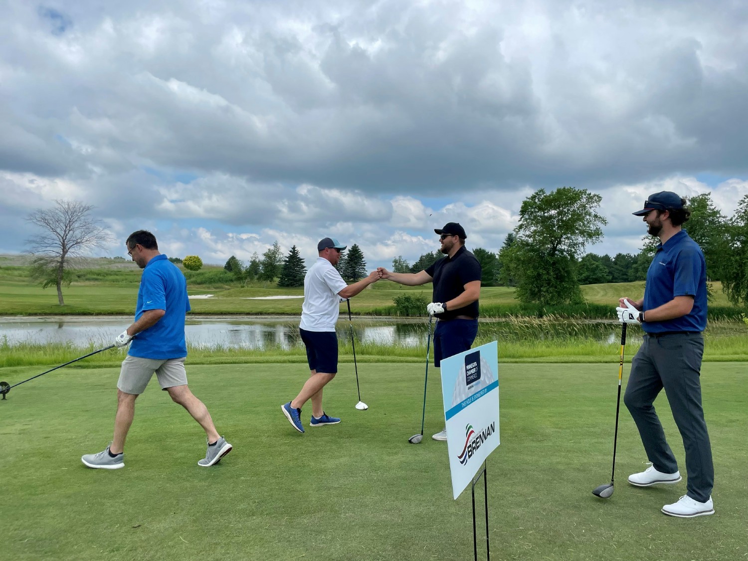 Brennan sponsored Growing Minnesota Golf Event and playing as a team