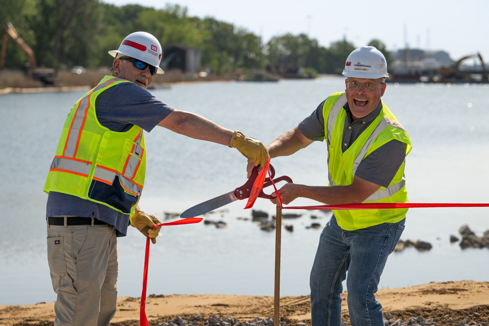 Excited team members commemorate the completion of another project.