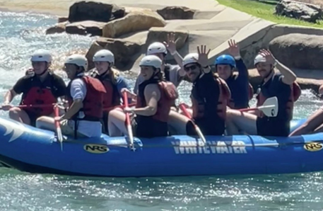 Summer associates white-water rafting.