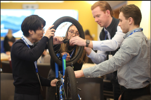 We continued our firm tradition of giving back by building bicycles for kids in need.