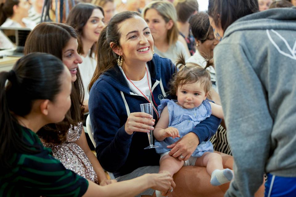 CEO & co-founder Jenn Hyman with daughter Aurora at company celebration