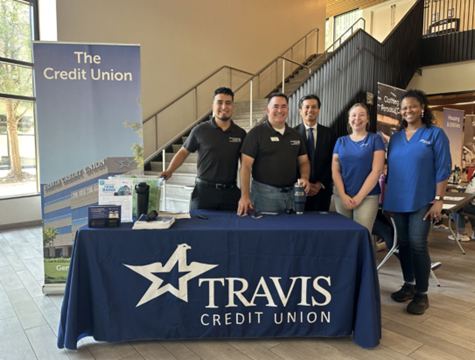 TCU team members volunteer with Generation Wealth, helping teens build money‑management skills.