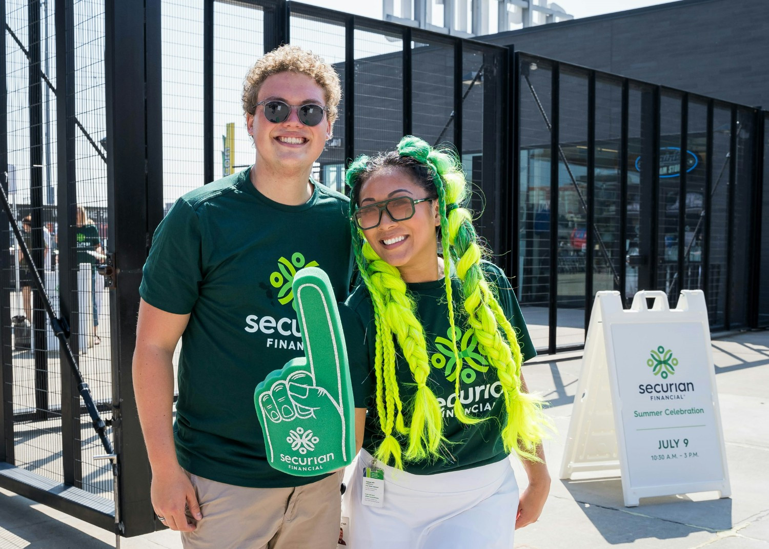Volunteers spreading excitement as they welcome associates to Securian's annual All-Associate Summer Picnic.