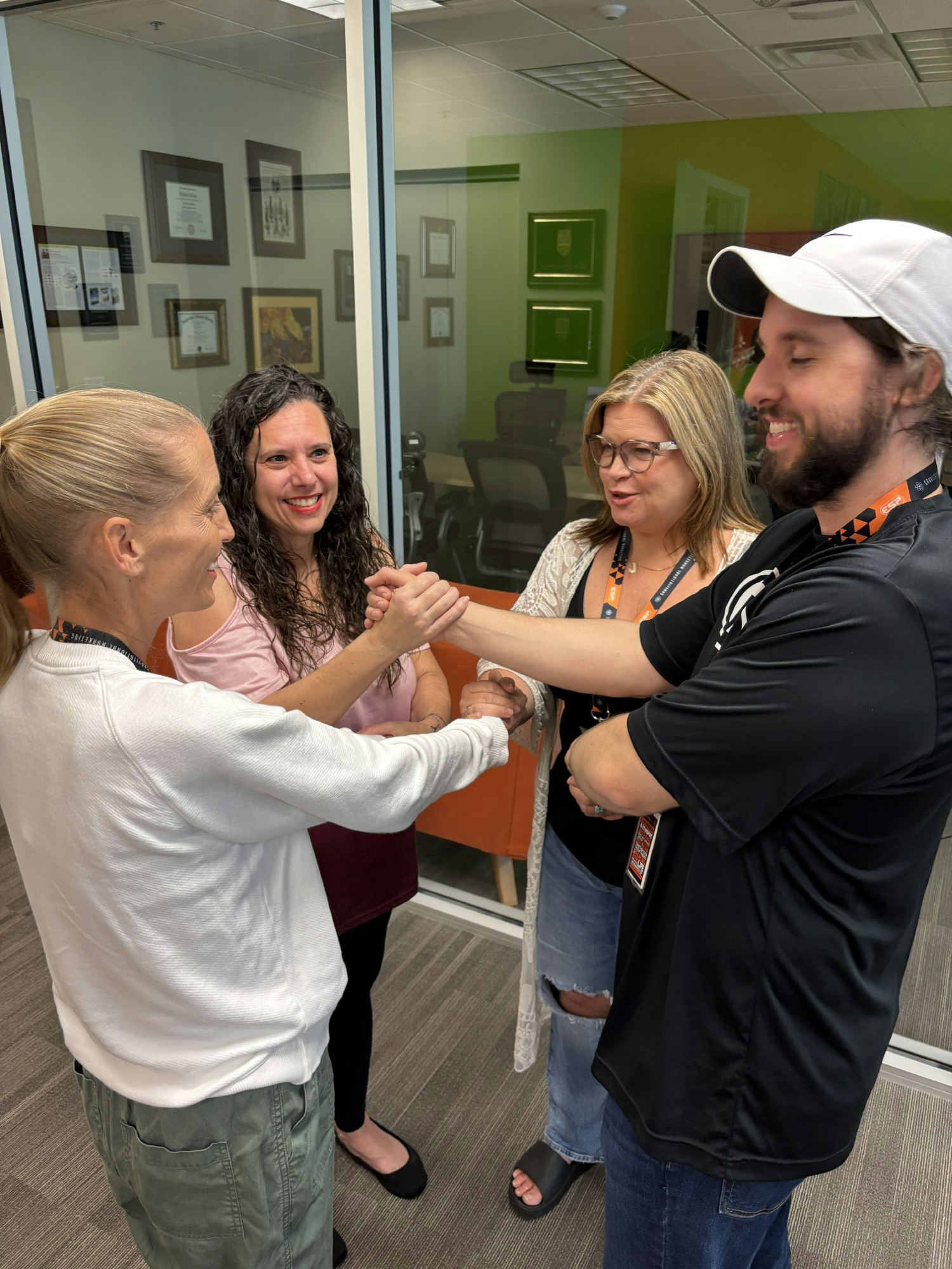 We believe in solving problems hand-in-hand—literally. Teamwork fuels our culture.