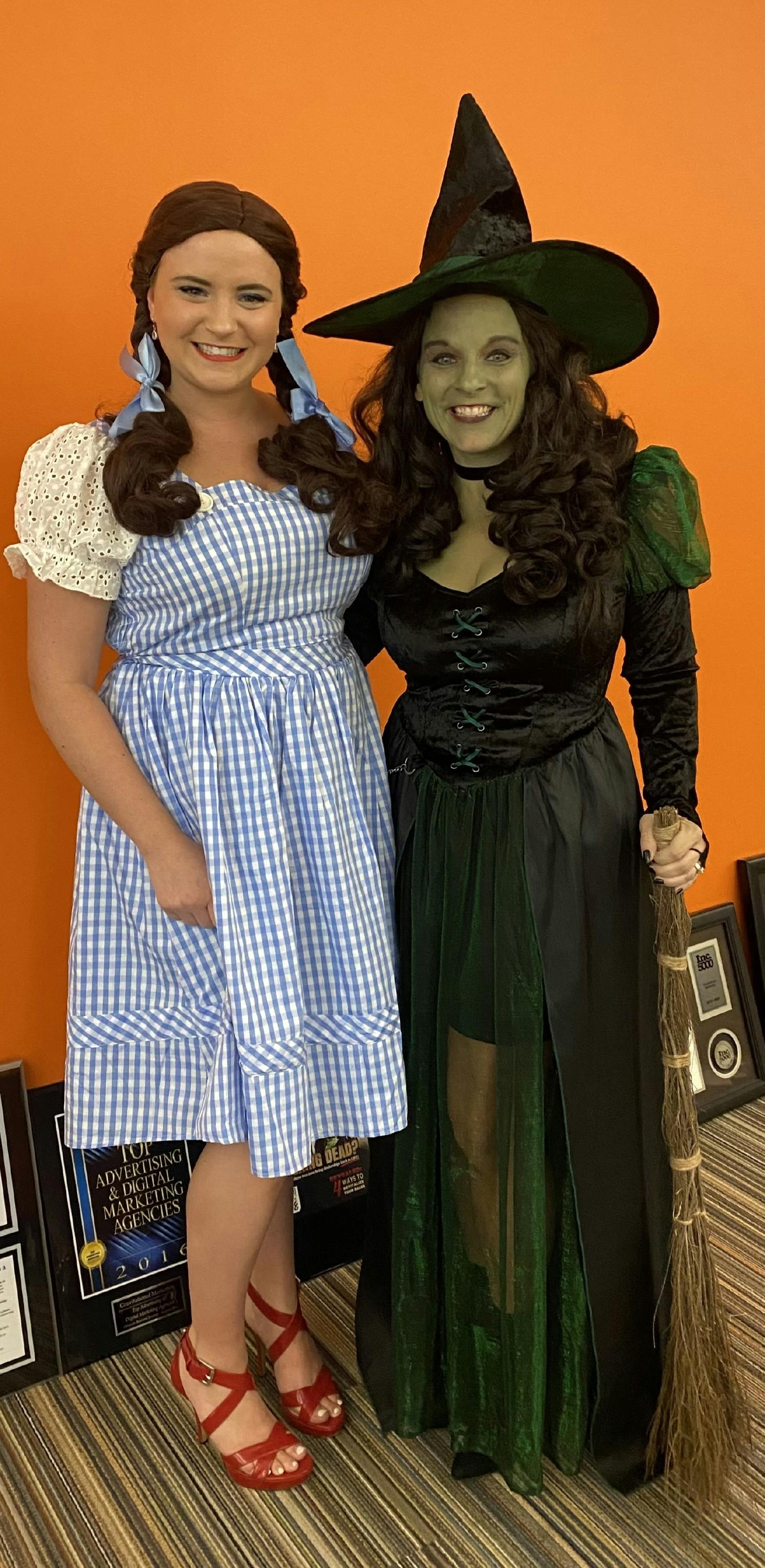 Dorothy and the Wicked Witch at the Gravitational Marketing Halloween Party!
