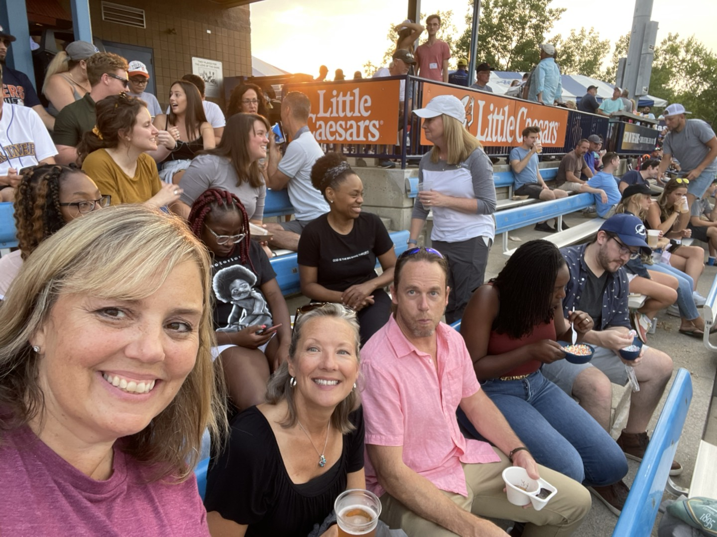 HR Collaborative celebrates after a quarterly meeting by taking all employees and families to the ball game!
