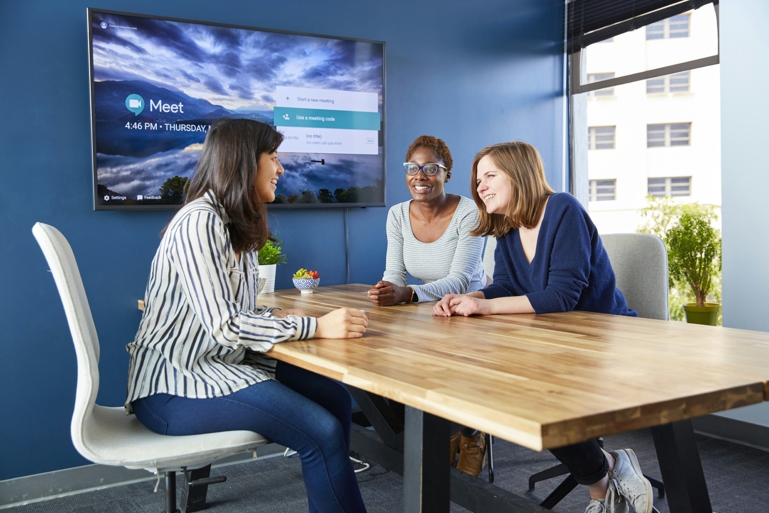 BlueViners collaborating in a conference room in Redwood City, CA.