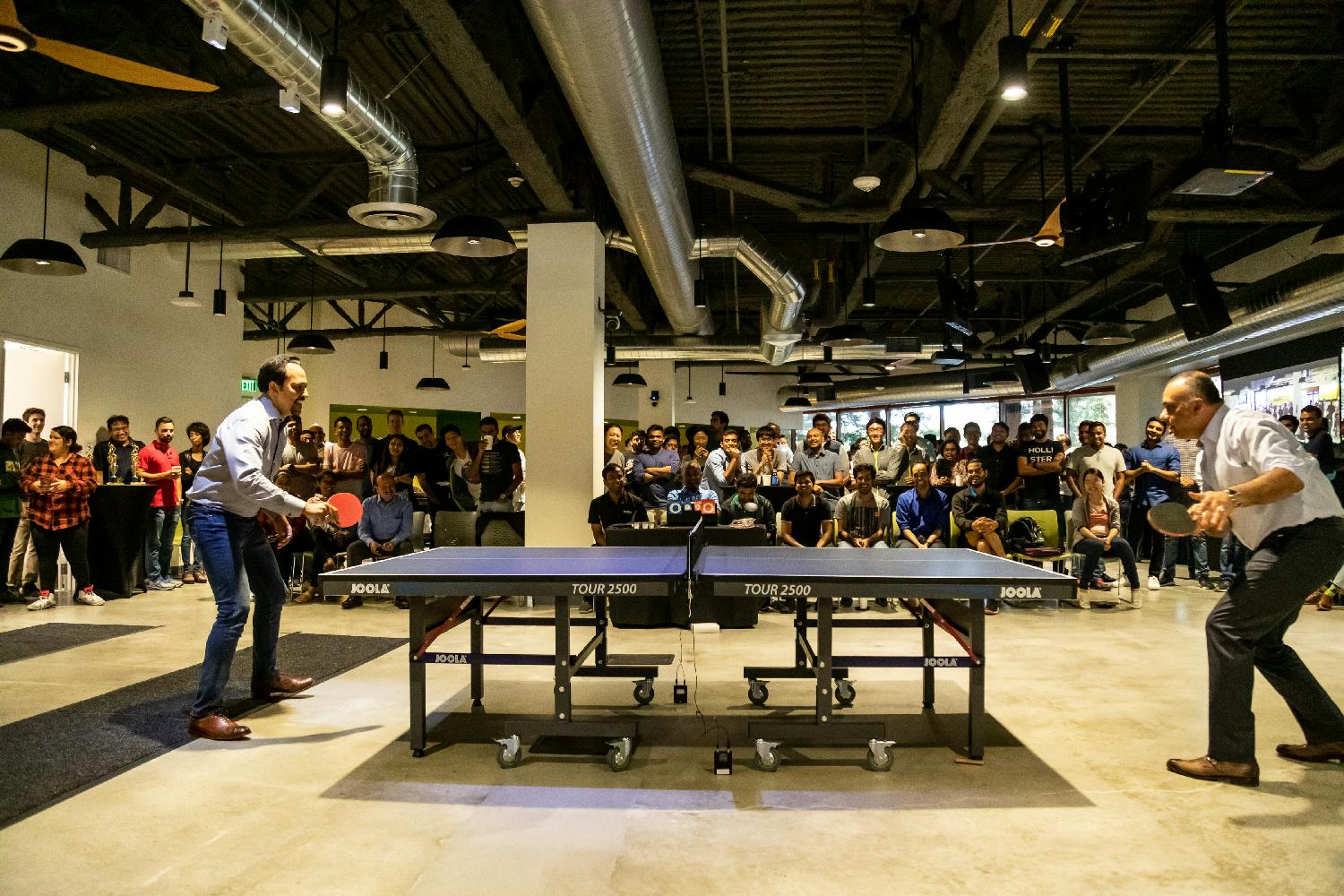 Dheeraj Pandey and David Sangster during ping pong championship