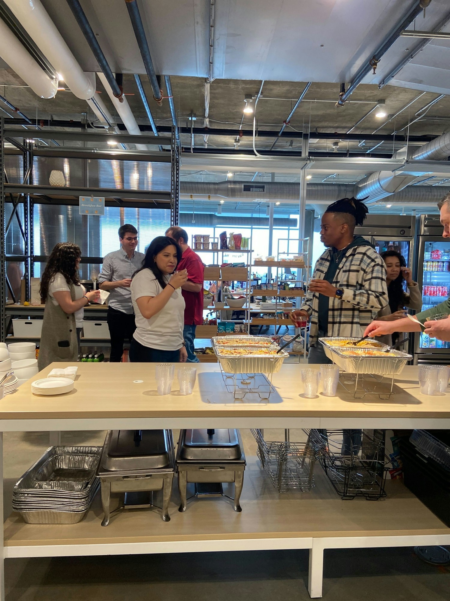 Intercom employees in Chicago enjoying a catered lunch.