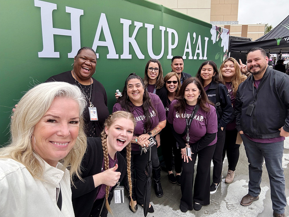 Team members gather for a group selfie at Hakup a'ai (Serrano word for 
