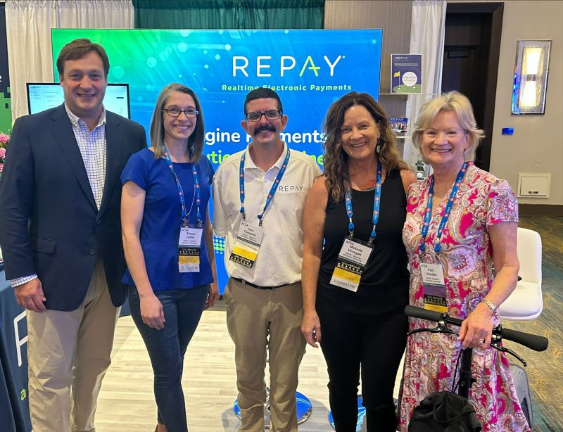 Our EVP of HR & VP of Marketing at REPAY's annual company-wide kick-off meeting, the State of Firm (SOF).