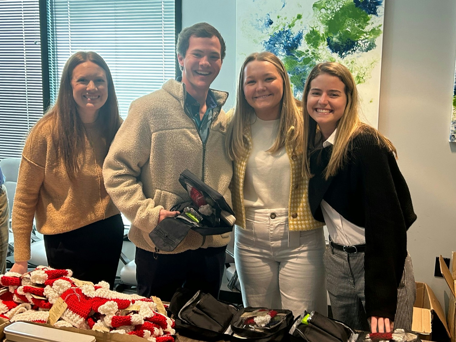 Atlanta-based teammates helping pack NICU kits for March of Dimes for our annual holiday service project