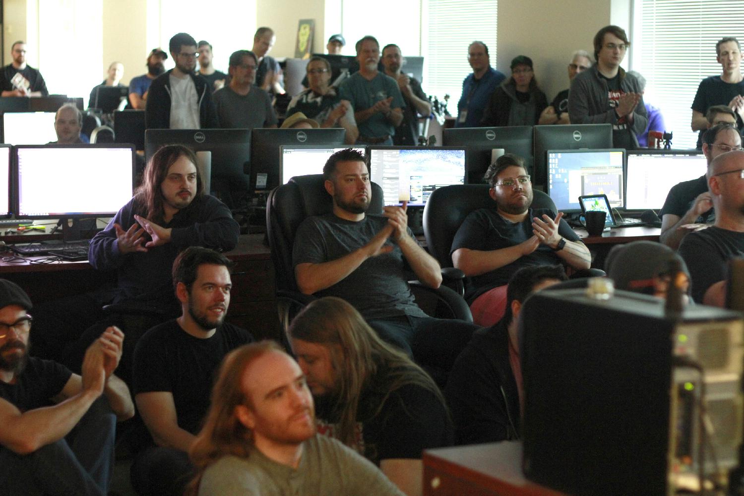 The Round Rock team cheering on their teammates during our Game Jam week where teams of employees got to work on creating their own game ideas. 