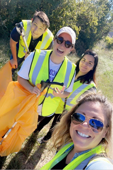 Employees volunteering for Road Clean-Up utilizing their 16 hours of Volunteer Time Off.