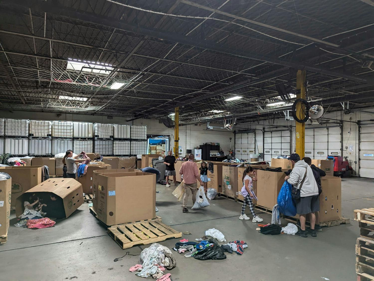 InfoTrust CEO and team come together to volunteer for Hurricane Helene relief at Matthew 25 Ministries.