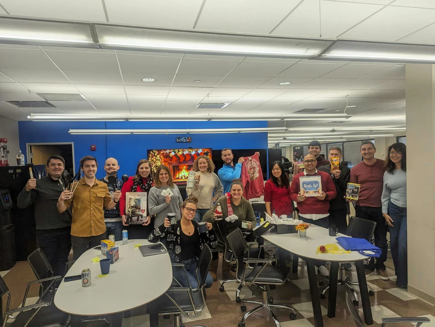InfoTrust team members celebrate the winter holidays with a festive Secret Santa gift exchange.