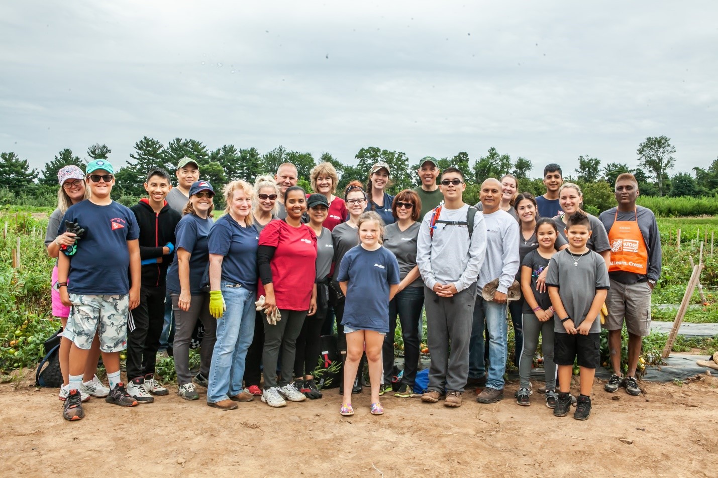 Affinity volunteers after harvesting corn at America’s Grow-a-Row