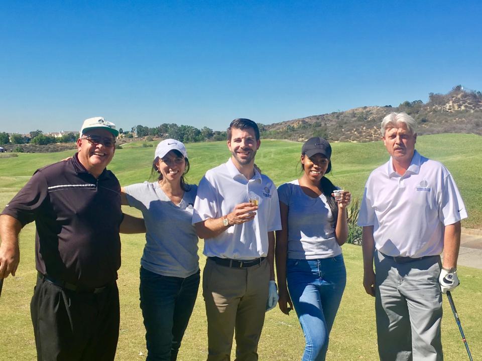 A few of Giroux employees at a charity golf event