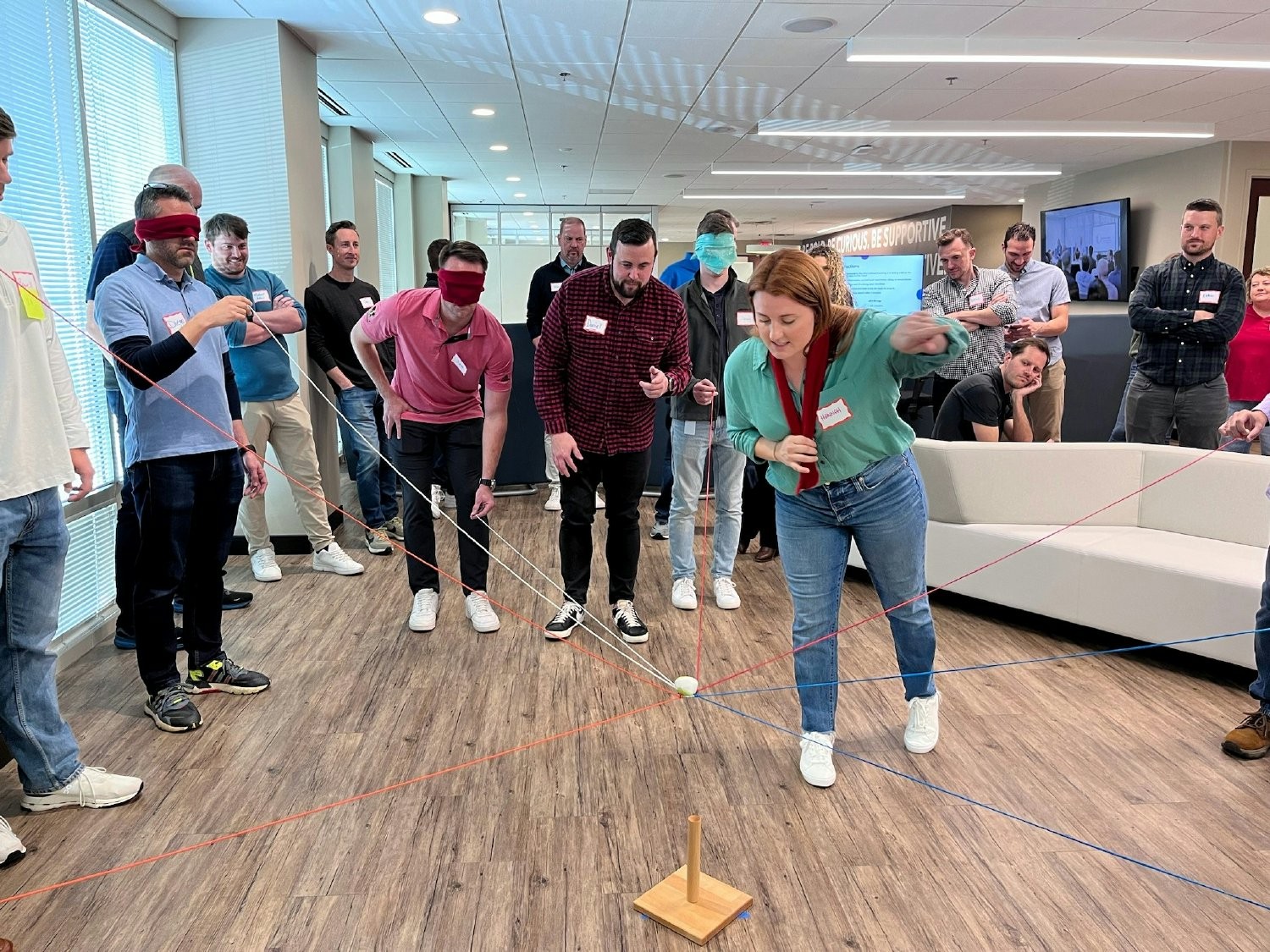 Who says meetings are boring? At our leadership event we practiced effective communication via a string ball challenge.