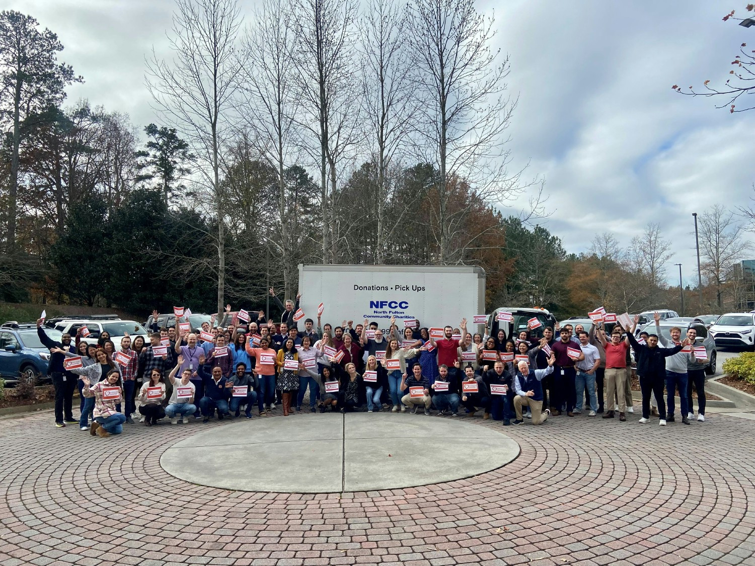 Employees packed 200 backpacks full of supplies for North Fulton Community Charities to help kids start the school year.