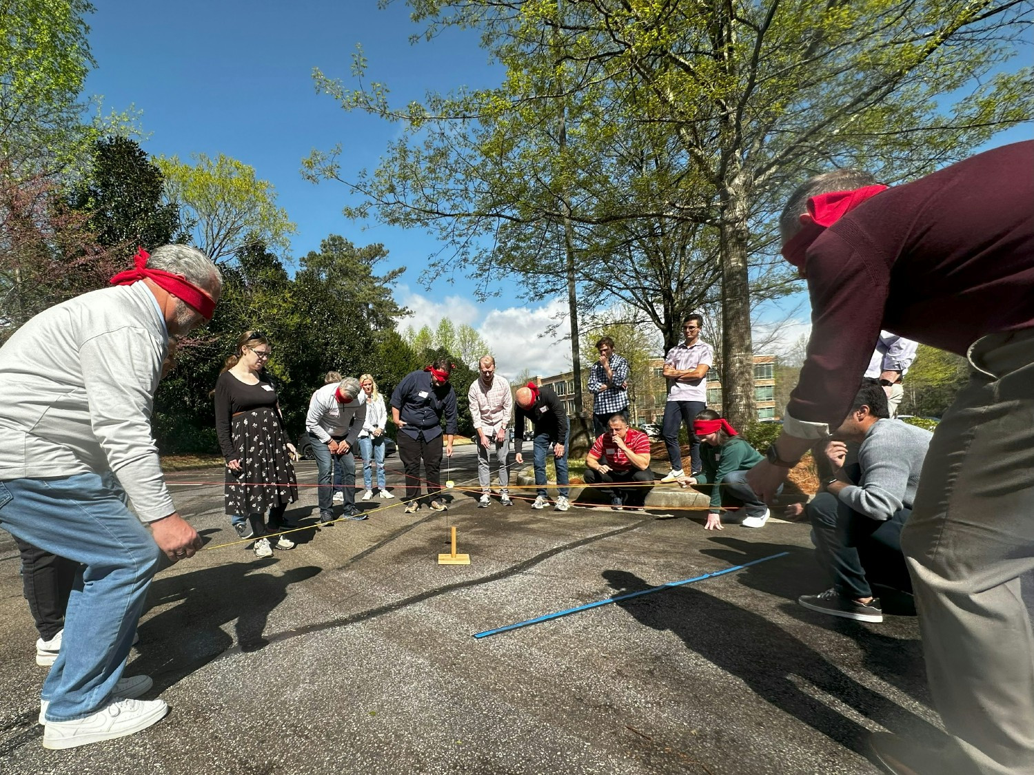 Who says meetings are boring? At our leadership event, leaders practiced communication through a blindfolded challenge.