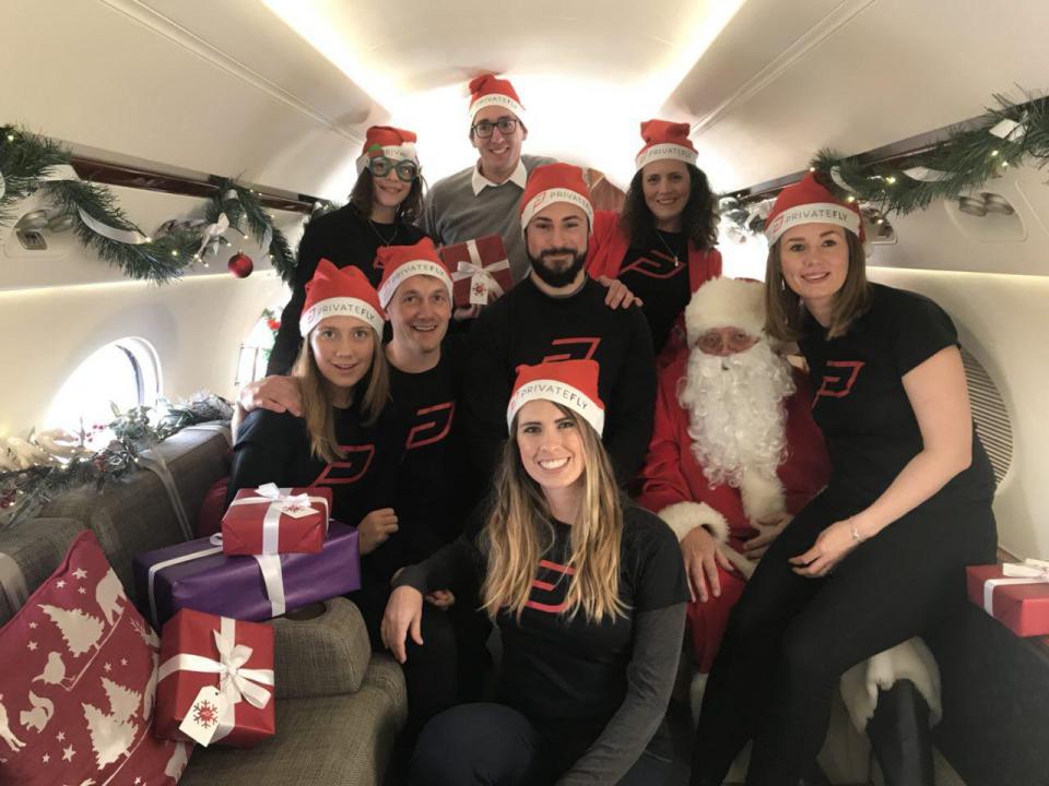 Team Posing After A Successful Christmas Event