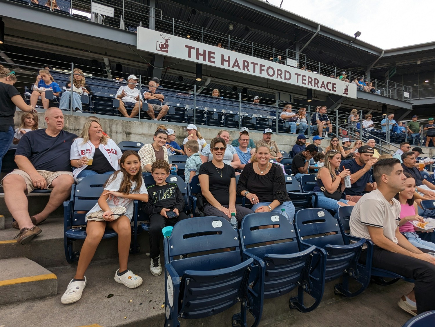 Employees and their guests enjoy a complimentary night out at the Hartford Yard Goats.