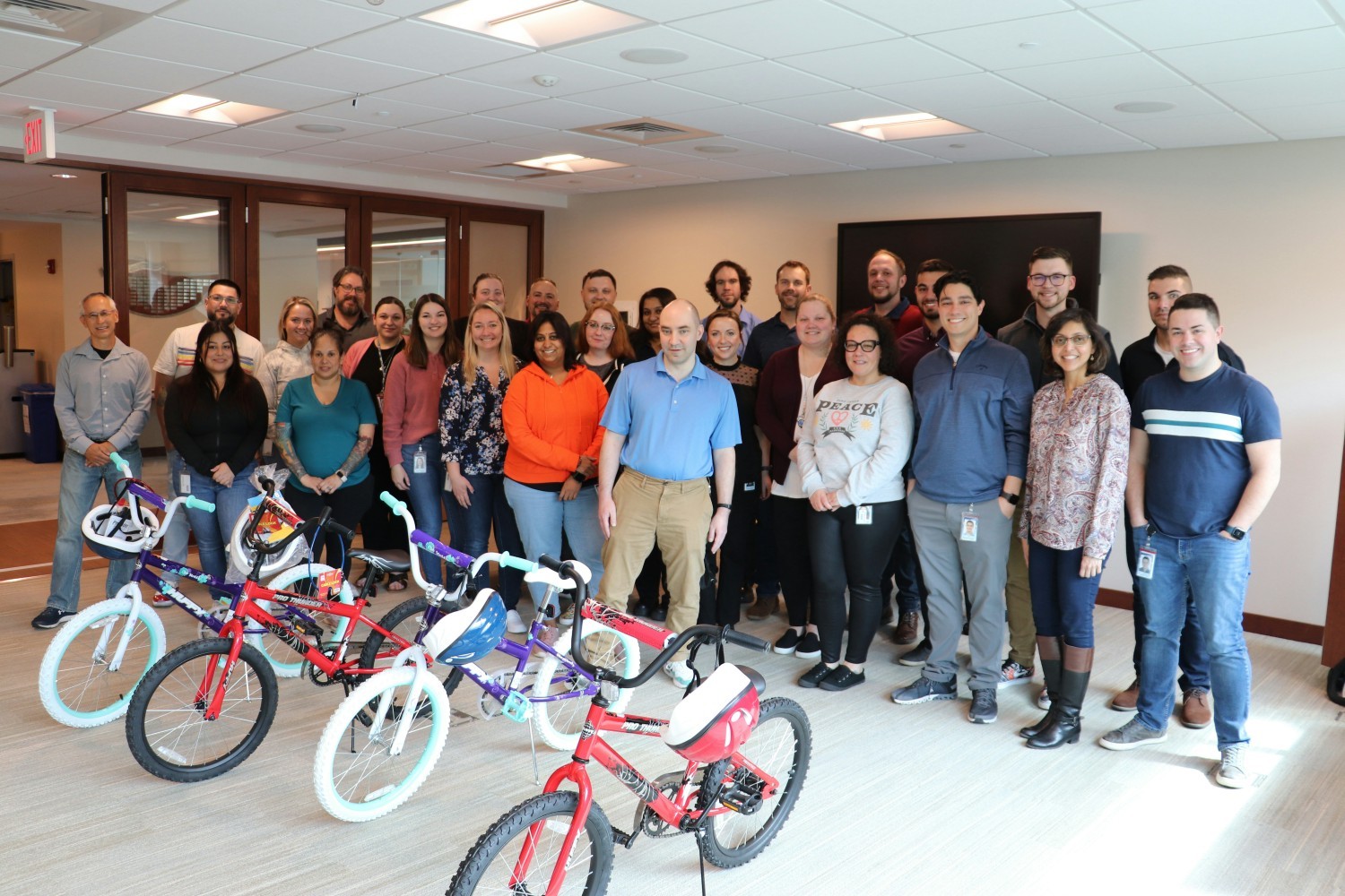Just one of many in-house team building events, COCC's bike builds benefit local community support organizations.