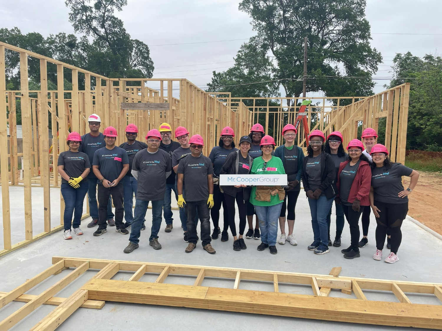 Mr. Cooper Group team members volunteering with Dallas Area Habitat for Humanity for our eleventh full-house build. 