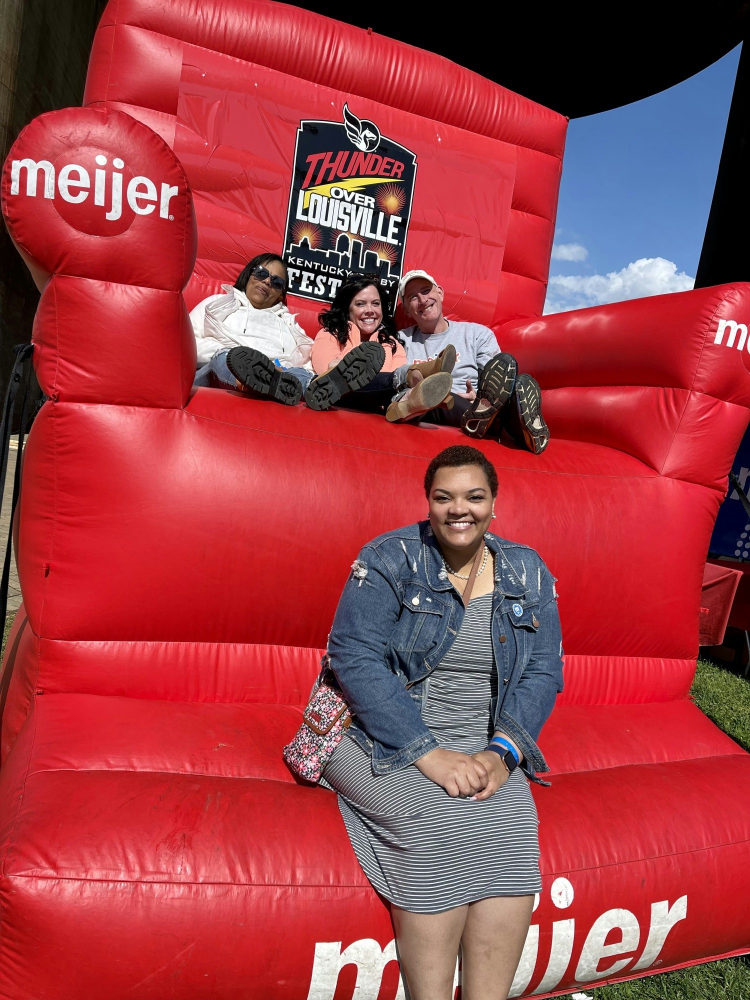 Team members strike a pose in the Meijer Family Fun Zone at Thunder Over Louisville.