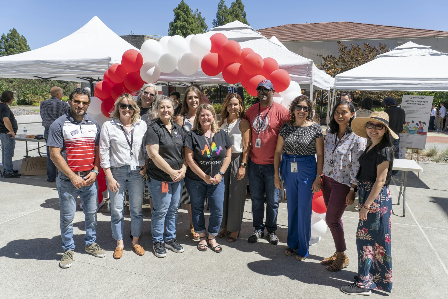 Chief Executive Officer Satish Dhanasekaran celebrates with employees