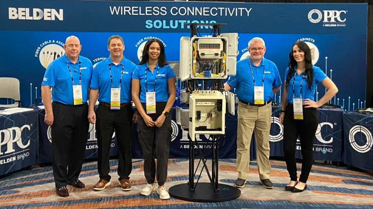 Employees at the NATE Unite Conference in Memphis highlighting Belden's wireless solutions.