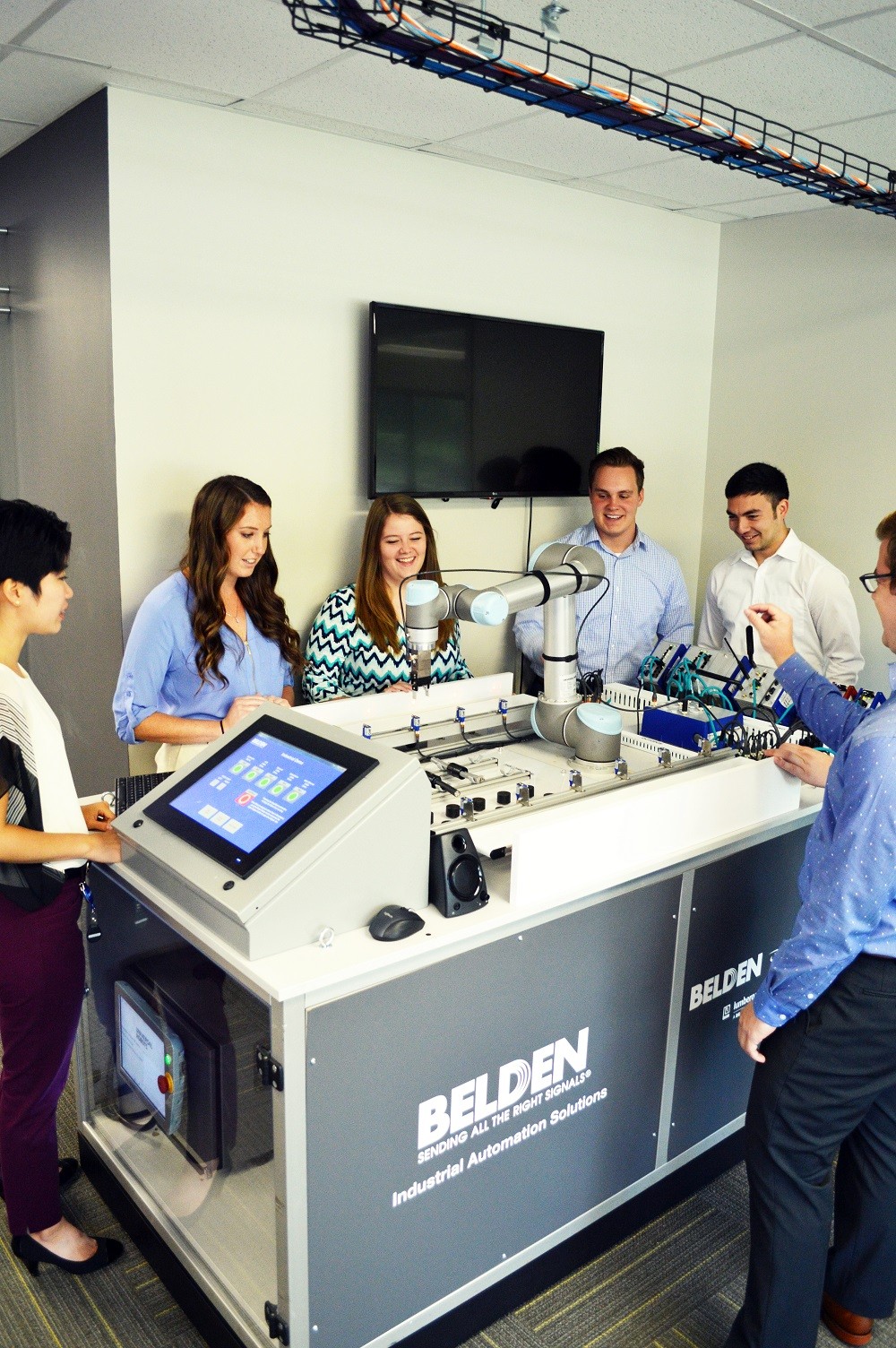 Early Career Leadership Program employees exploring Belden products in the hands-on lab.