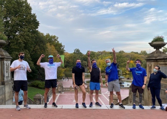 Leumi employees challenge each other to stay fit during a socially distanced run in Central Park. 