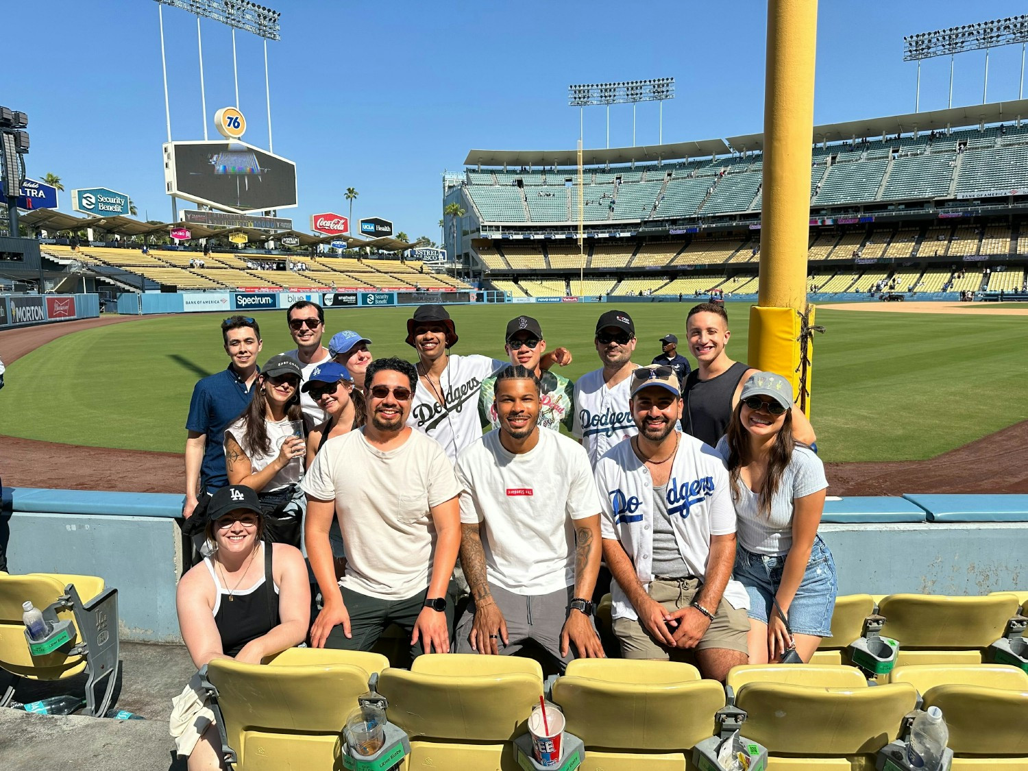 A company photo with speakers from Angel City Football Club, a women's soccer team that CDM sponsors 