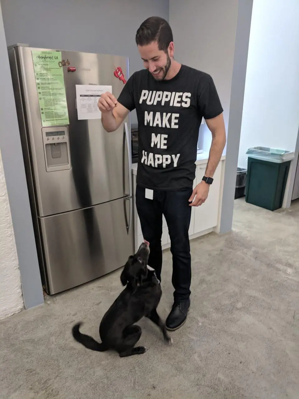 One of our employees with one of our office pups