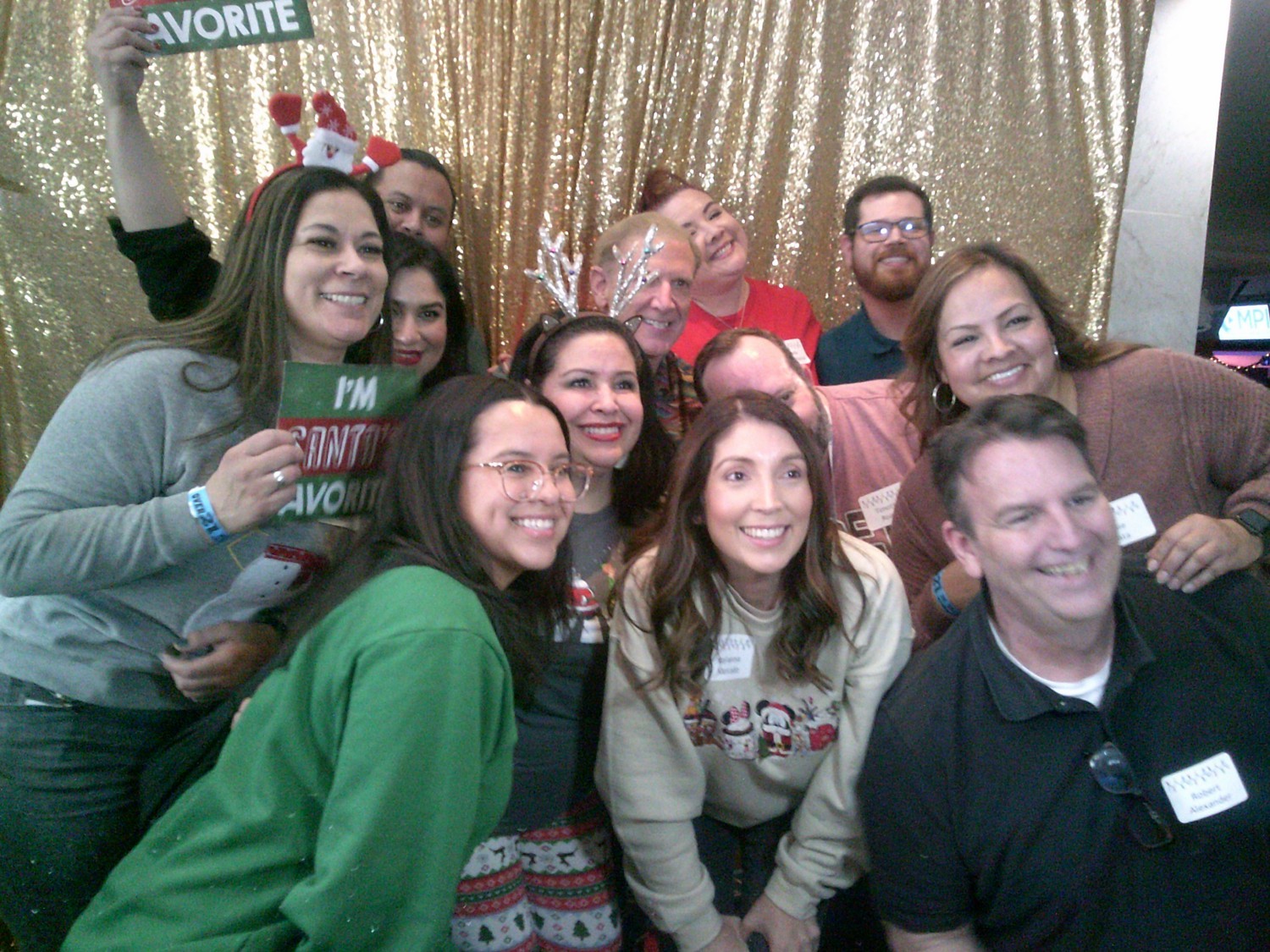 Celebrating year-end accomplishments at holiday party photo booth!