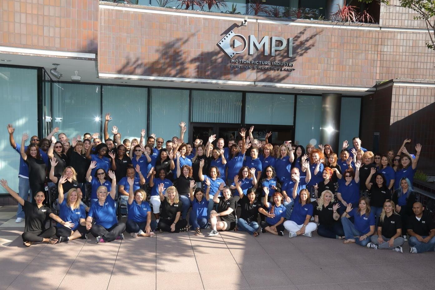 Employees sporting their MPI-branded gear in the courtyard in front of the Studio City, CA office.