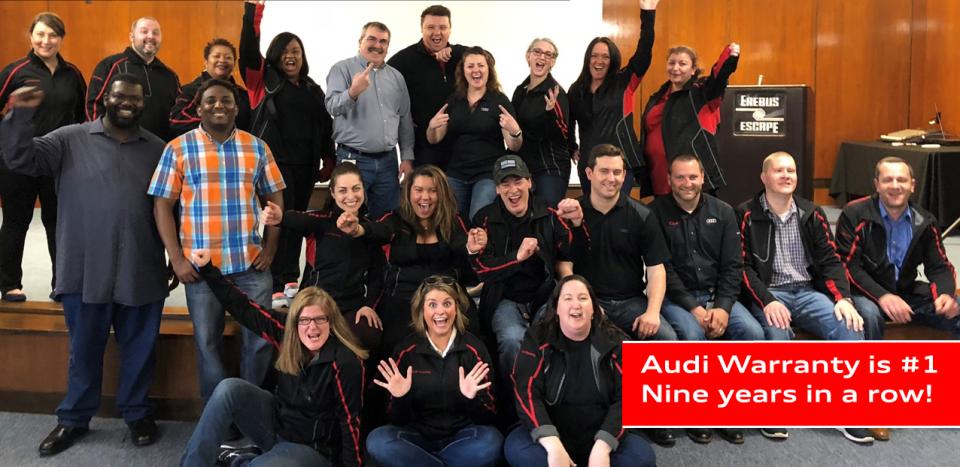 Our Auburn Hills team celebrating continuous performance excellence by Audi Warranty.