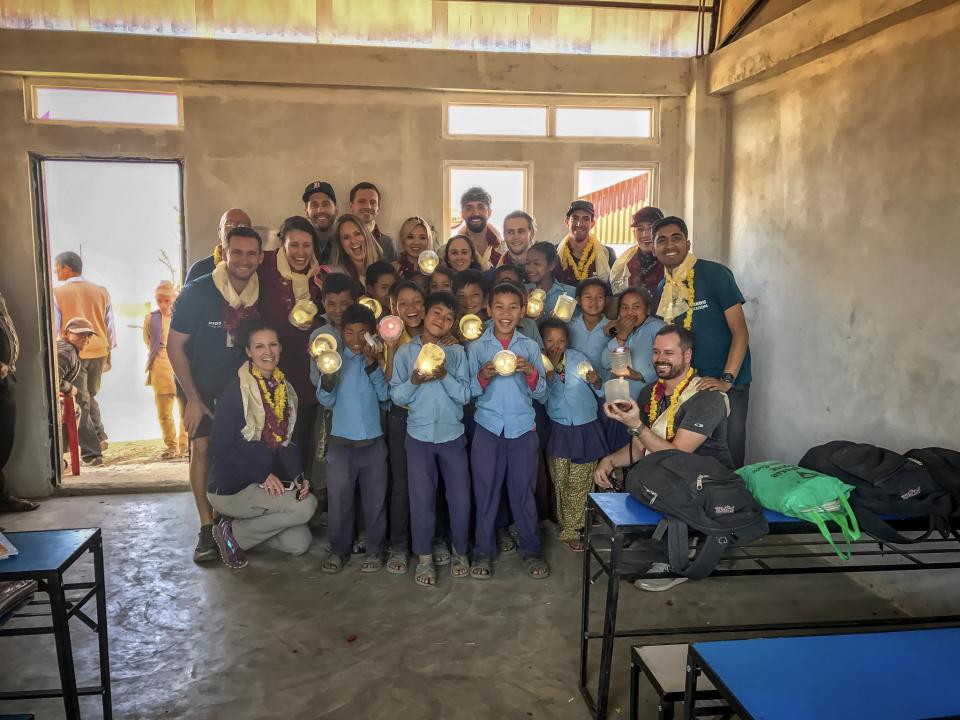 Recent 'What's Your Summit' activity where  employees helped to build a school and solar powered reading lights for children in Nepal.