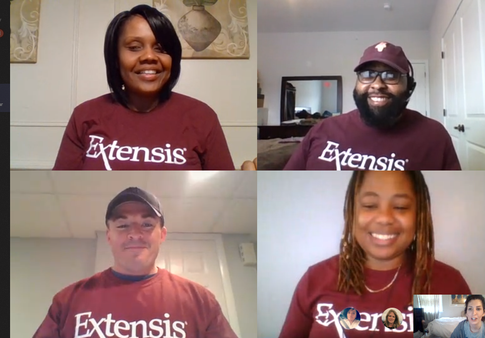 Team members matching with their Extensis swag on a video call.