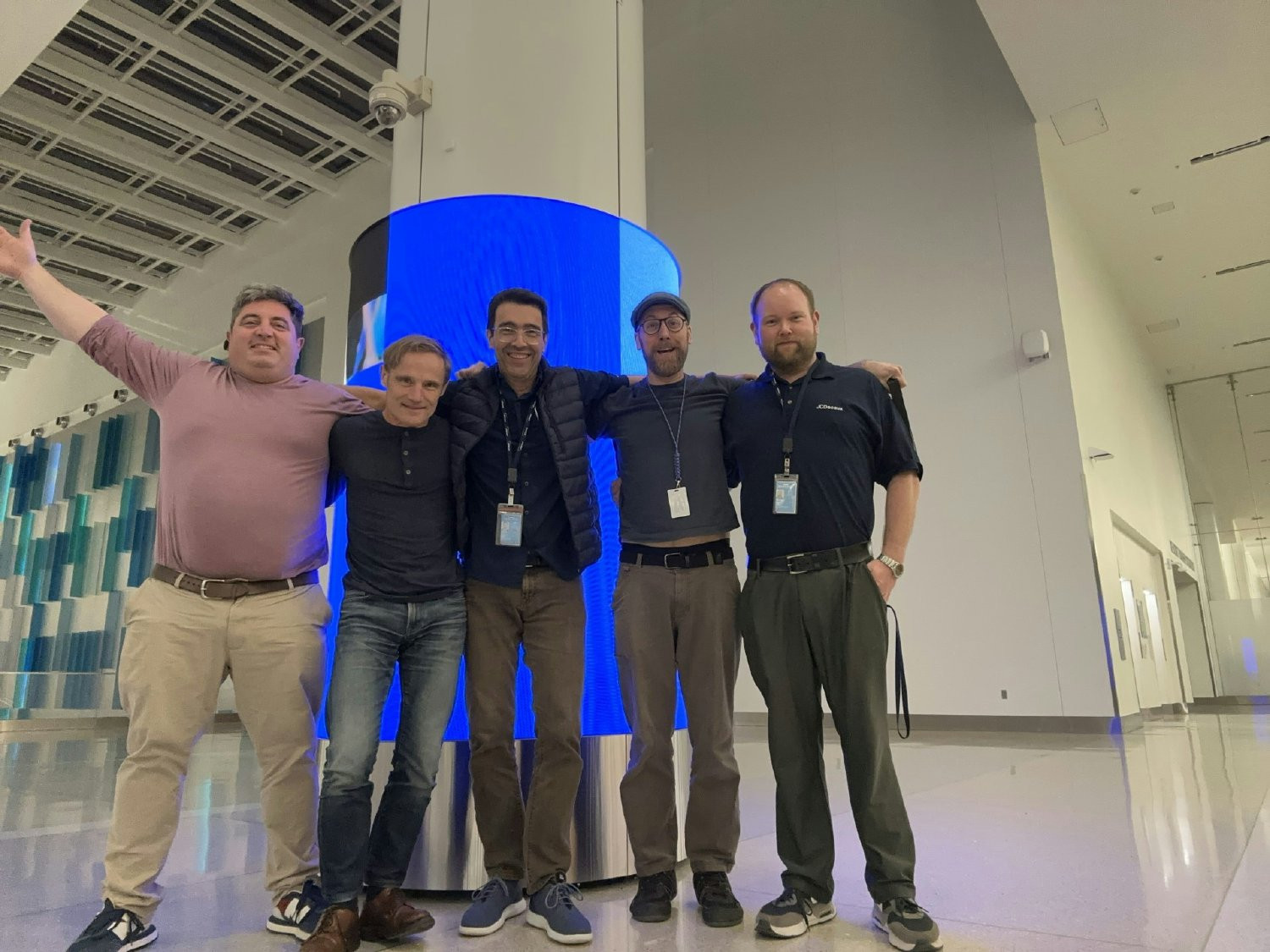 Operations Team celebrating a successful digital install at MCO Airport 