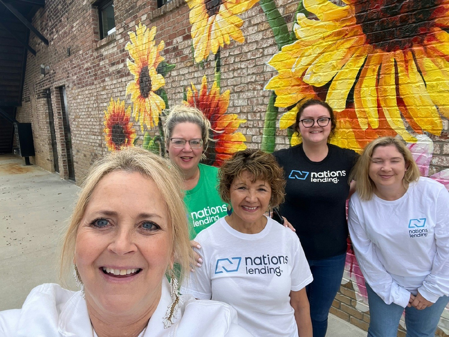 Nations Lending employees at our Southaven, Mississippi branch office snap a selfie after completing their Color Walk