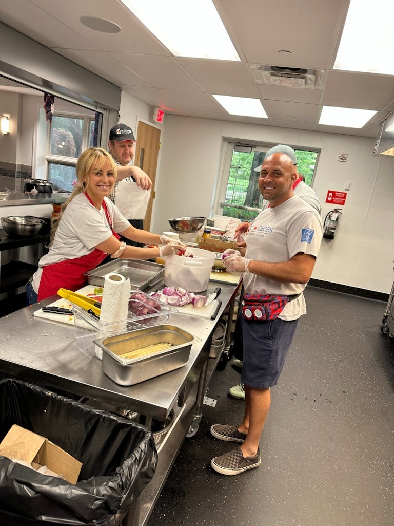Nations Lending employees volunteer their time at Ronald McDonald House in Cleveland making dinners for families in need