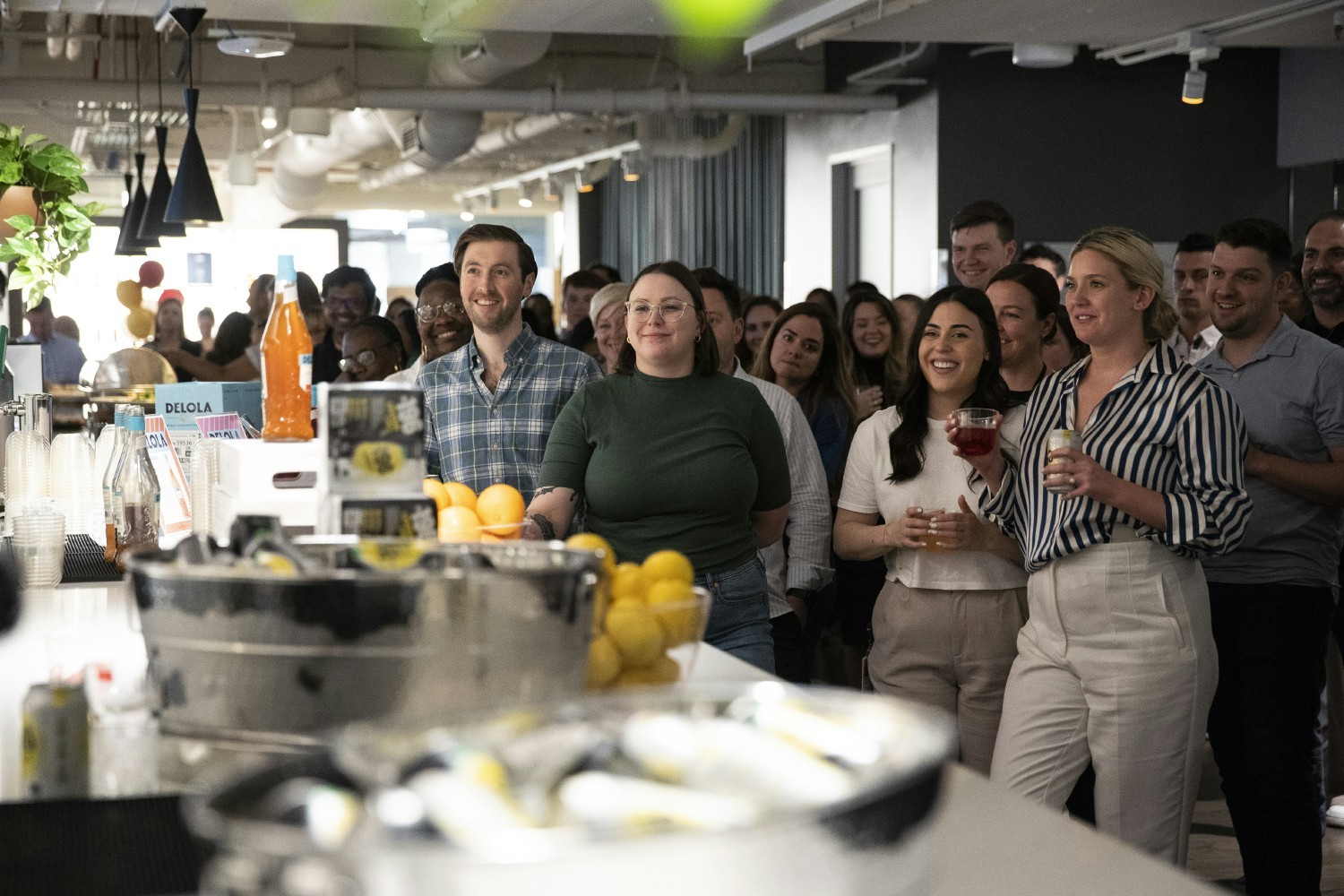 Beam Suntory employees gathered at the Chicago office to celebrate a product launch together.