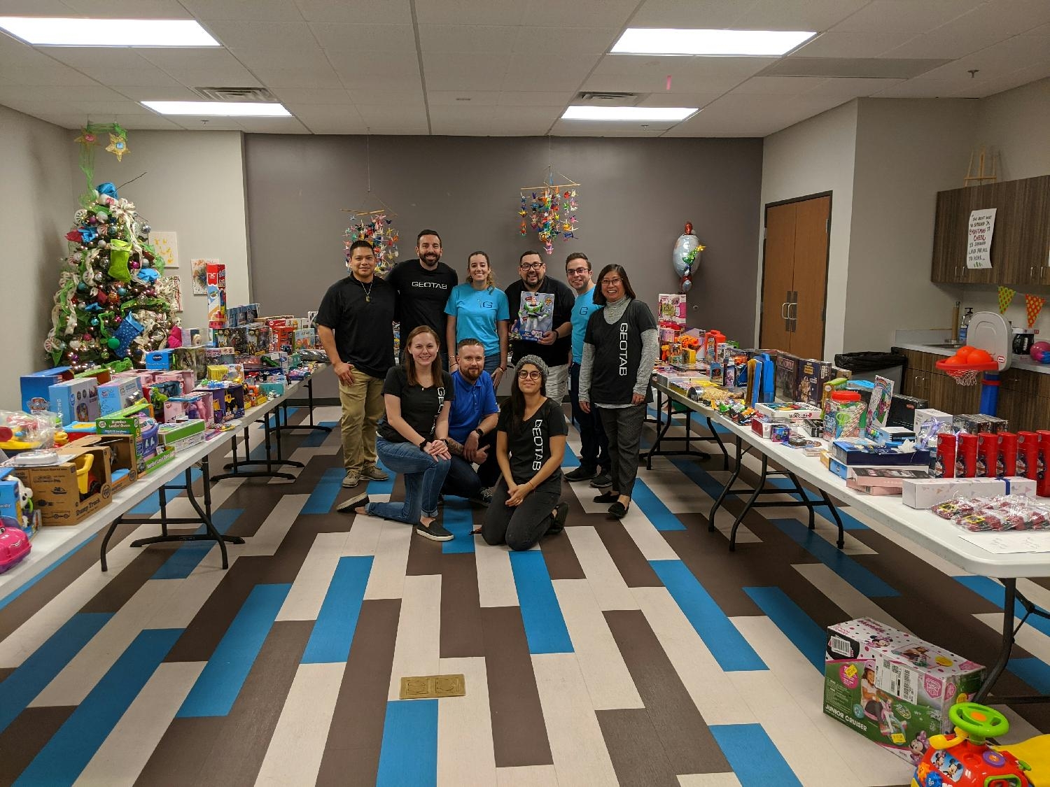 Geotab staff participating in a holiday toy drive