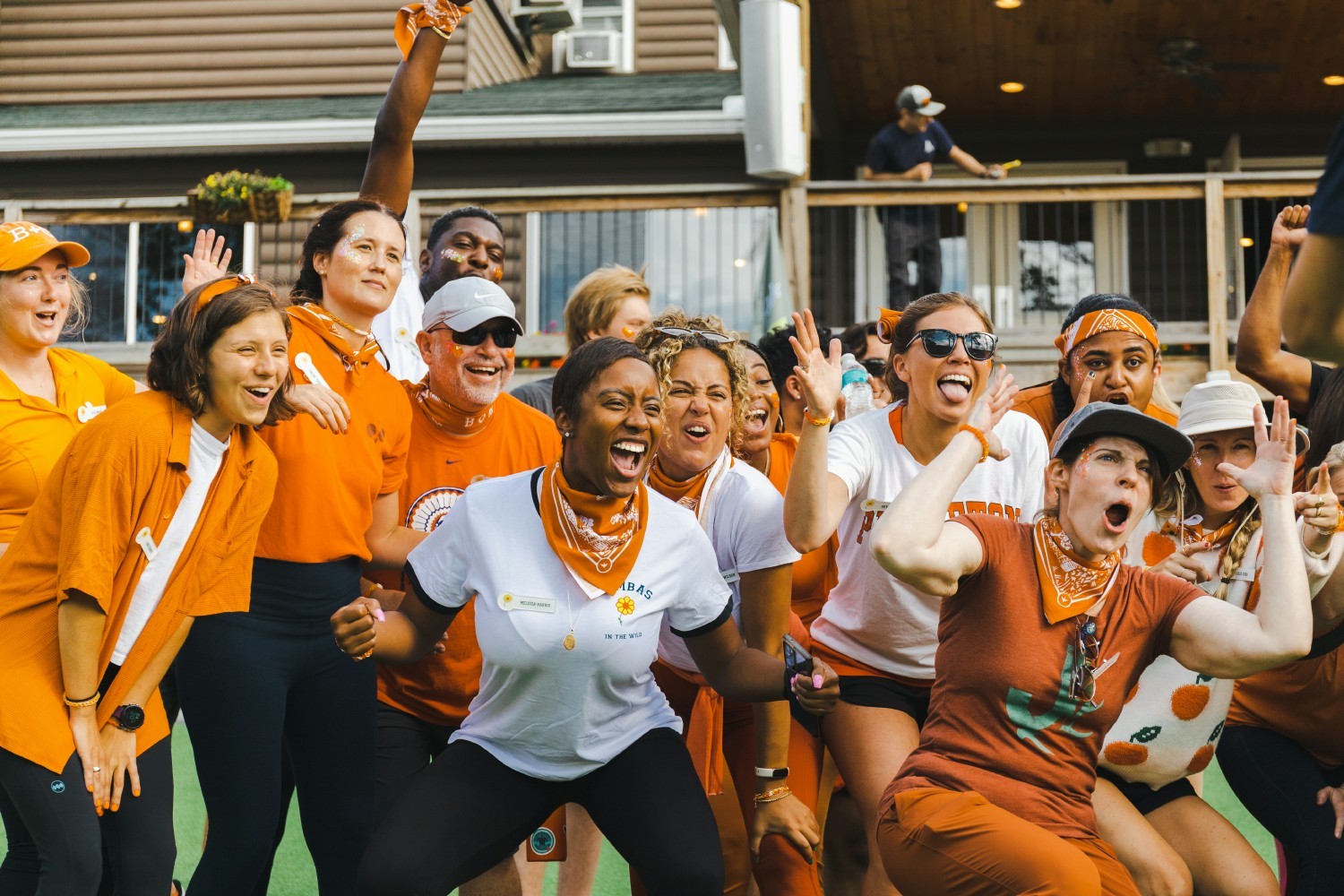 Orange team showing their spirit at the Bombas Fall Retreat '22.