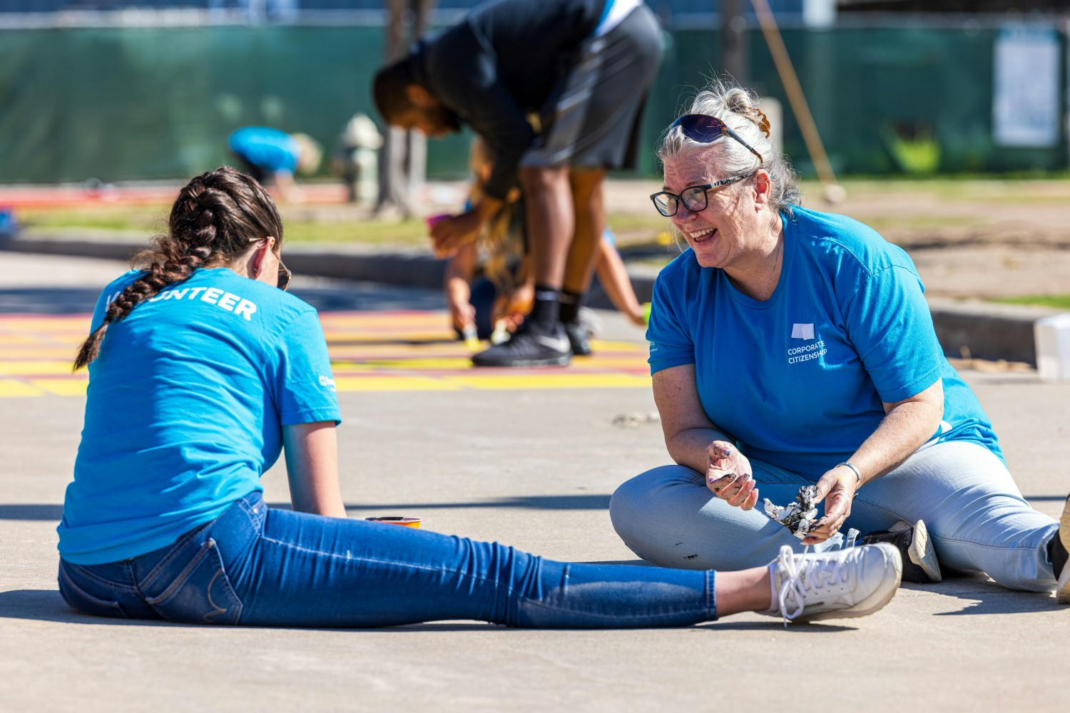 Two Insperity employees participate in a volunteer activity benefitting a local autism center in Humble, Texas.